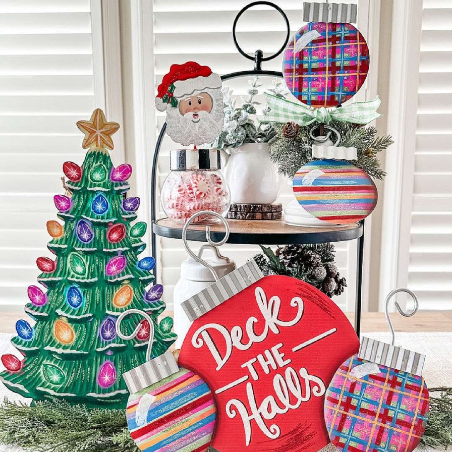 The Round Top Collection Table Decor | Pile Of Merry & Bright Ornaments